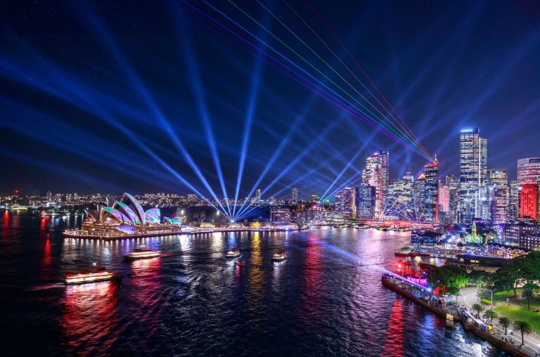 View of the Circular Quay and city, lit up during Vivid 2024